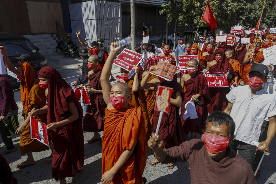 Buddhist monks lead a protest march against the military coup in Mandalay, Myanmar on Wednesday, Feb. 10, 2021. Protesters continued to gather Wednesday morning in Mandalay breaching Myanmar's new military rulers' decrees that effectively banned peaceful public protests in the country's two biggest cities. (AP Photo)