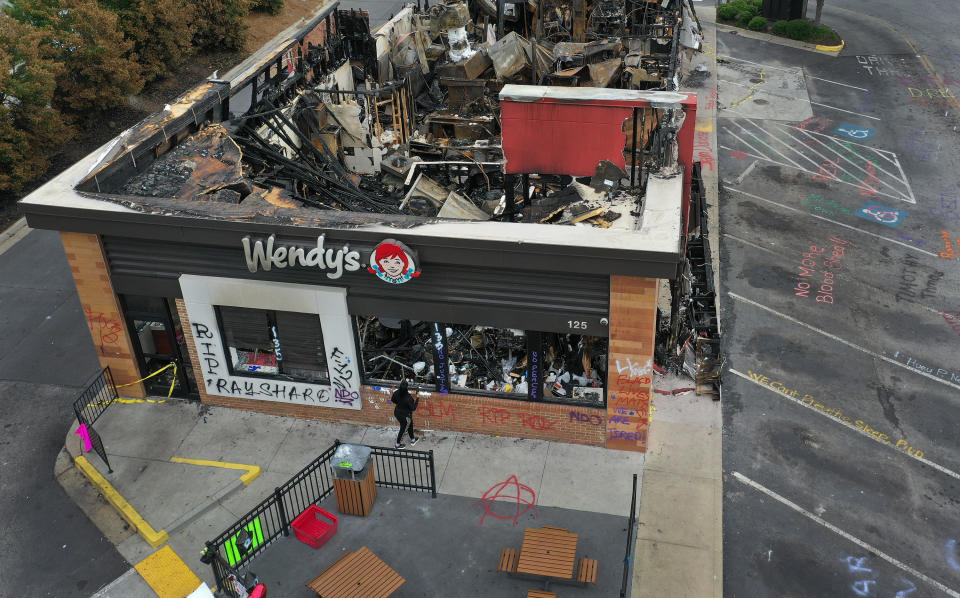 The Wendy's restaurant that was set on fire by demonstrators after Rayshard Brooks was killed is seen on June 17, 2020 in Atlanta, Georgia. / Credit: Joe Raedle/Getty Images