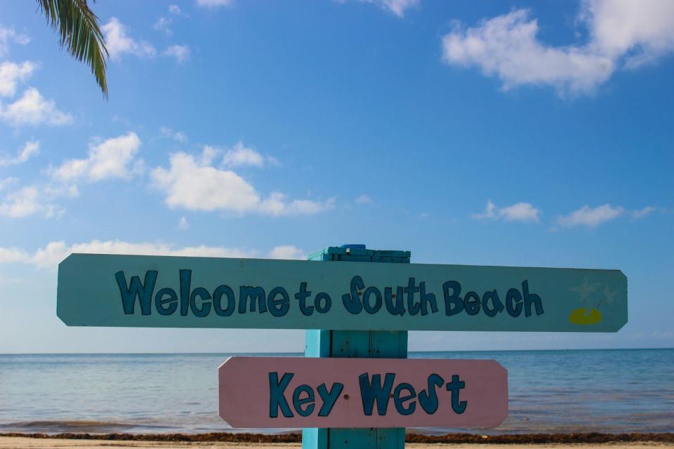 The beaches of the Florida Keys are top attractions. 
pictured: a sign in the Florida Keys