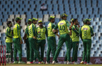 Pakistan players watches the video appeal during the fourth and final T20 cricket match between South Africa and Pakistan at Centurion Park in Pretoria, South Africa, Friday, April 16, 2021. (AP Photo/Themba Hadebe)