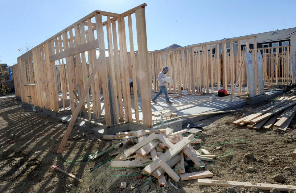 In this December 2020 file photo, construction workers frame one of the last units at the Westerly townhomes in Simi Valley. In Ventura County, residential building permits grew in 2022 but remain below what they were in 2018, and construction employment has not recovered to pre-pandemic levels, an economic report released Thursday says.