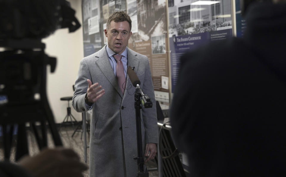 Defense attorney Casey Arbenz speaks to the media after all three Tacoma Police officers were declared not guilty in the killing of Manny Ellis in Pierce County Superior Court Thursday, Dec. 21, 2023, in Tacoma, Wash. (Ellen M. Banner/The Seattle Times via AP, Pool)