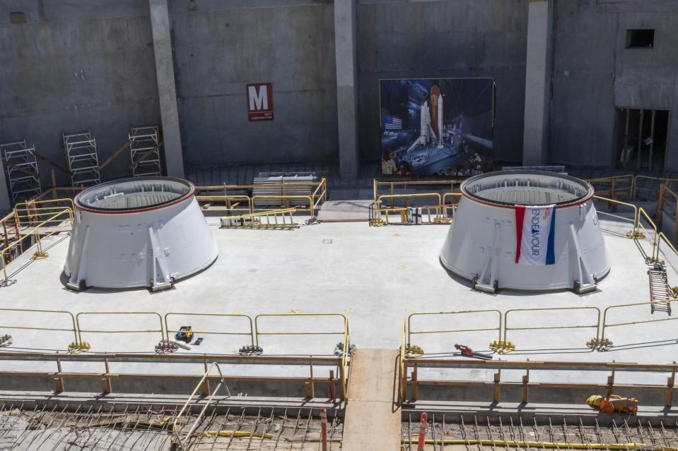 The aft skirts in position on the concrete pad.