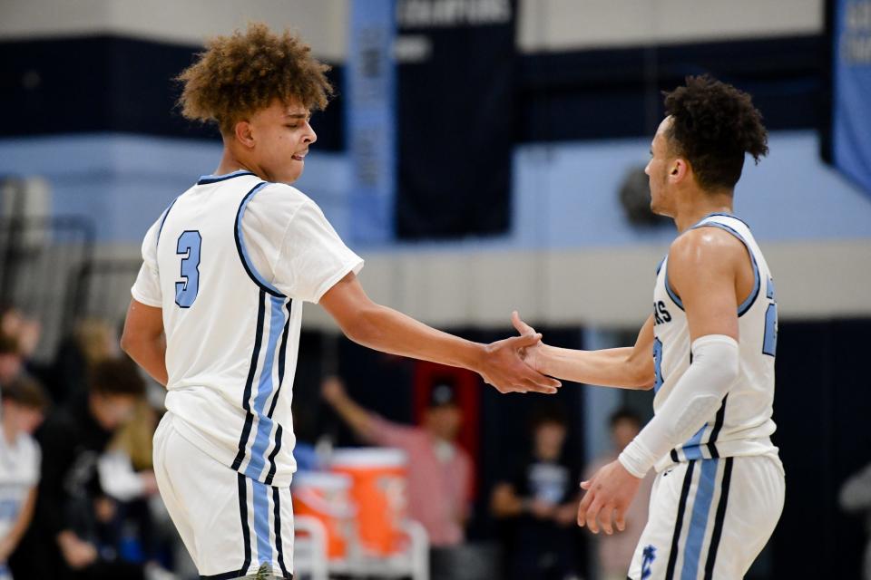 Central Valley's Isaiah Jeter (3) and Andre Vacich react after Jeter's bucket. He was fouled on the play.