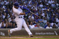 Chicago Cubs' Willson Contreras launches his grand slam off Pittsburgh Pirates relief pitcher Bryse Wilson during the first inning of a baseball game Monday, May 16, 2022, in Chicago. (AP Photo/Charles Rex Arbogast)