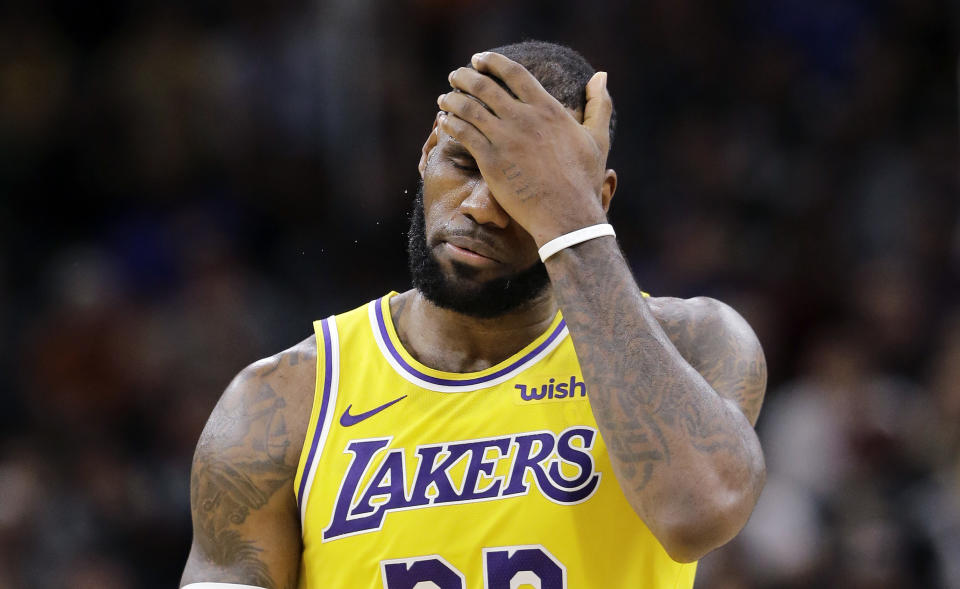 A Lakers fan really messed up an in-game promotion. (AP Photo)