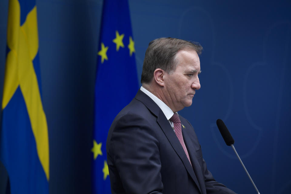 Sweden's Prime Minister Stefan Lofven pauses, during a coronavirus news conference, in Stockholm, Friday, Dec. 18,2020. The Swedish government is tightening nationwide coronavirus restrictions by lowering the number of people who can gather in a restaurant and making face masks mandatory on public transportation. Sweden has stood out among European nations for its comparatively hands-off response to the pandemic. (Jessica Gow/TT News Agency via AP)