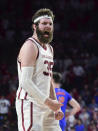 Oklahoma forward Tanner Groves celebrates the team's win over Florida in an NCAA college basketball game in Norman, Okla., Wednesday, Dec. 1, 2021. (AP Photo/Kyle Phillips)