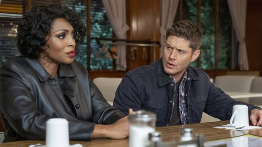 Supernatural -- The CW TV Series, Supernatural -- "Drag Me Away (From You)" -- Image Number: SN1516B_0779r.jpg -- Pictured (L-R): Lisa Berry as Billie and Jensen Ackles as Dean -- Photo: Colin Bentley/The CW -- © 2020 The CW Network, LLC. All Rights Reserved. Lisa Berry and Jensen Ackles in "Supernatural" on The CW.