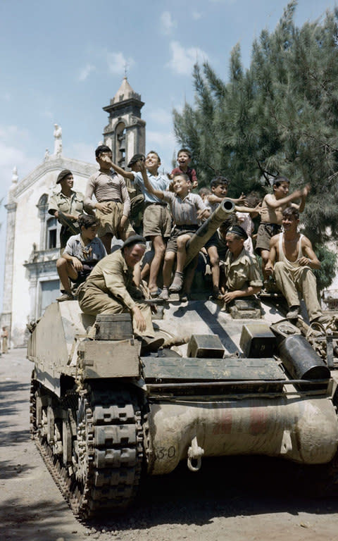 British troops aboard a Sherman tank in Sicily, August 1943 - the month that Fusilier Graham was killed in action. - Credit: PA