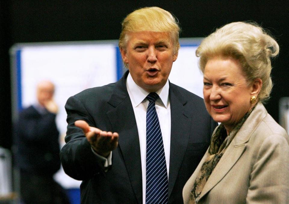 PHOTO: Donald Trump gestures as he stands next to his sister Maryanne Trump Barry, during a break in proceedings of the Aberdeenshire Council inquiry into his plans for a golf resort, Aberdeen, northeast Scotland, June 10, 2008. (David Moir/Reuters, FILE)