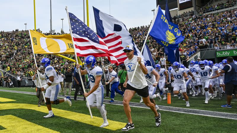 BYU players take to the field in Autzen Stadium before game Saturday, Sept. 17, 2022, in Eugene, Ore. 