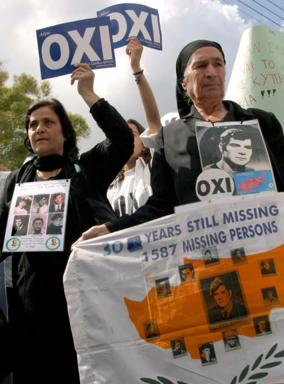 Relatives of people missing since the 1974 Turkish invasion of Cyprus protest against a UN peace plan in Nicosia 22 April, 2004