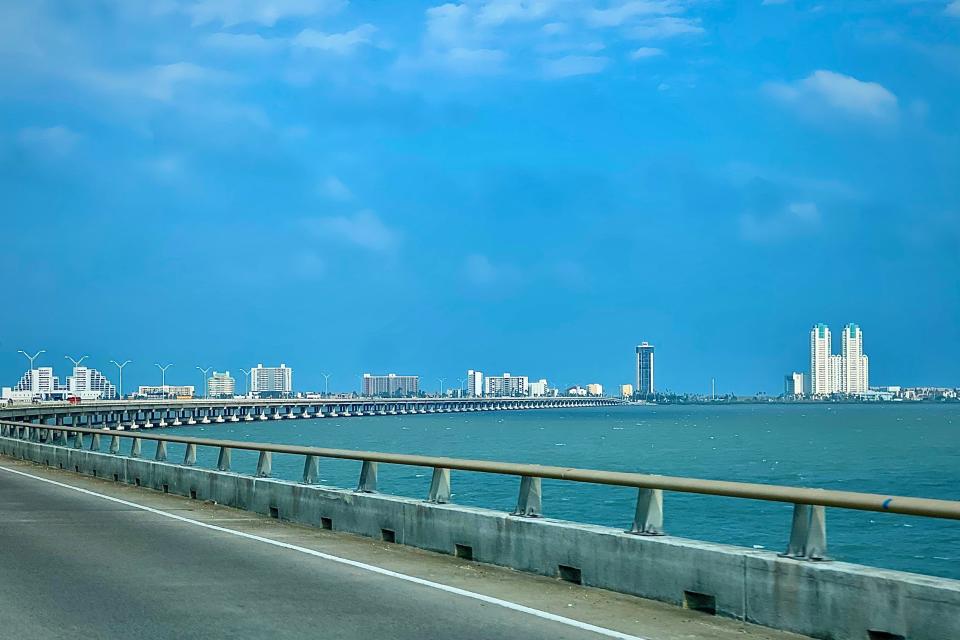 Blue sky and water taken from a causeway.