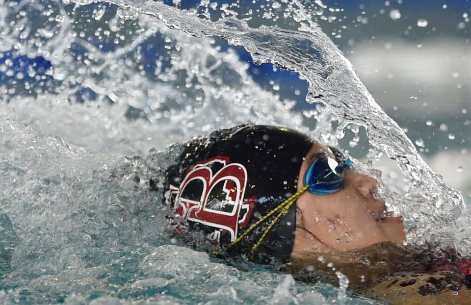 Flour Bluff's Jennifer Pena competes in the 100-yard backstroke at the District 30-5A Swim Meet, Friday, Jan. 29, 2021. Pena broke a district and school record with 57.09.