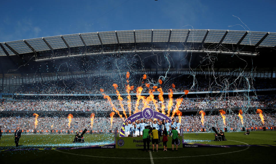 <p>Soccer Football – Premier League – Manchester City vs Huddersfield Town – Etihad Stadium, Manchester, Britain – May 6, 2018 Manchester City celebrate with the trophy after winning the Premier League title Action Images via Reuters/Carl Recine EDITORIAL USE ONLY. No use with unauthorized audio, video, data, fixture lists, club/league logos or “live” services. Online in-match use limited to 75 images, no video emulation. No use in betting, games or single club/league/player publications. Please contact your account representative for further details. </p>