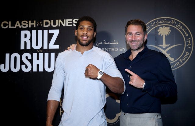 Anthony Joshua, left, is promoted by Eddie Hearn (Nick Potts/PA)