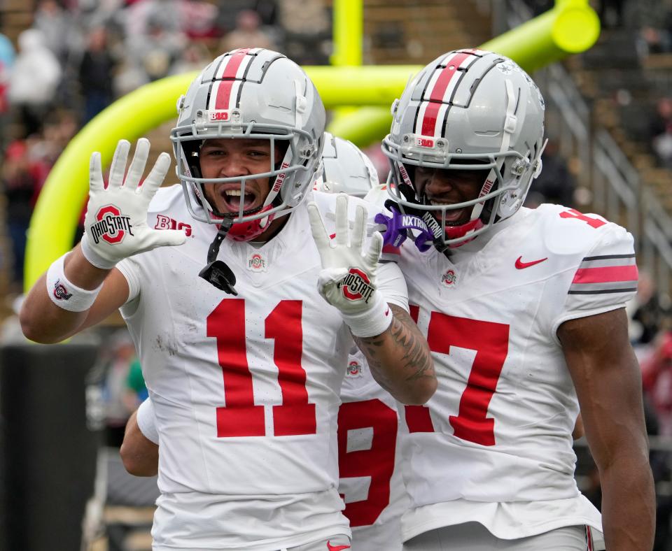 Oct. 14, 2023; Lafayette, In., USA; 
Ohio State Buckeyes wide receiver Brandon Inniss (11) celebrates after scoring a touchdown during the second half of Saturday's NCAA Division I football game against the Purdue Boilermakers at Ross-Ade Stadium in Lafayette.