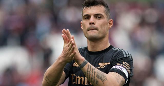 Granit Xhaka applauds the Arsenal fans after a draw against West Ham Credit: Alamy