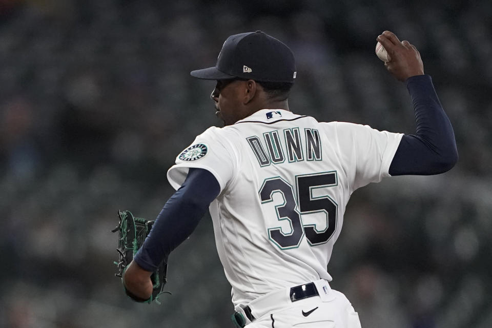 Seattle Mariners starting pitcher Justin Dunn throws against the Chicago White Sox during the first inning of a baseball game, Wednesday, April 7, 2021, in Seattle. (AP Photo/Ted S. Warren)