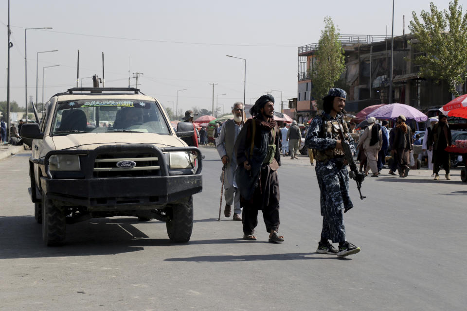 Taliban fighters walk in the city of Kabul, Afghanistan, Saturday, Sept. 4, 2021. (AP Photo/Wali Sabawoon)