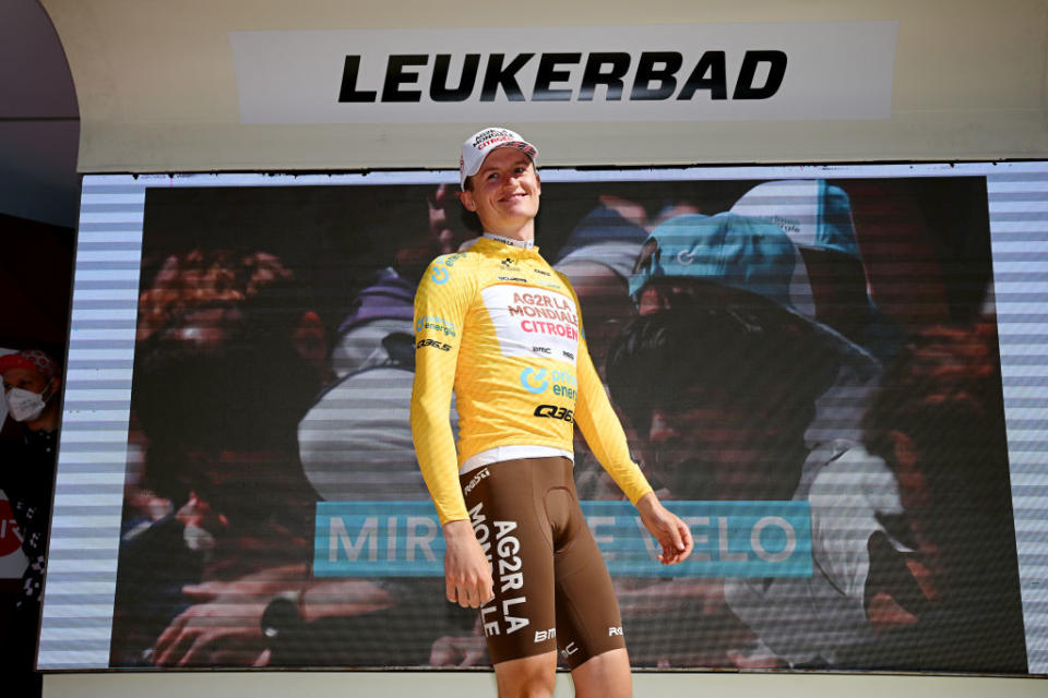 LEUKERBAD SWITZERLAND  JUNE 14 Felix Gall of Austria and Ag2R Citron Team celebrates at podium as Yellow leader jersey winner during the 86th Tour de Suisse 2023 Stage 4 a 1525km stage from Monthey to Leukerbad 1367m  UCIWT  on June 14 2023 in Leukerbad Switzerland Photo by Dario BelingheriGetty Images