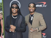 FILE - Takeoff, left, and Quavo, of Migos, arrive at the ESPY Awards in Los Angeles on July 10, 2019. A representative confirms that rapper Takeoff is dead after a shooting outside of a Houston bowling alley early Tuesday, Nov. 1, 2022. Takeoff , whose real name was Kirsnick Khari Ball, was 28. (Photo by Jordan Strauss/Invision/AP, File)