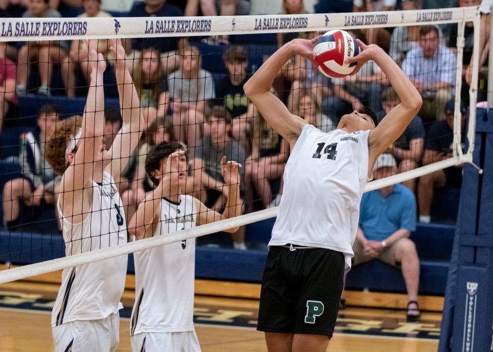 Pennridge's Riley Kodidek sets during a first round PIAA Class 3A match at La Salle College High School in Springfield Township on Tuesday, May 31, 2022. The Rams advance to the quarterfinals with a 3-0 sweep against the Explorers.