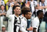 Soccer Football - Serie A - Juventus v Fiorentina - Allianz Stadium, Turin, Italy - April 20, 2019 Juventus' Cristiano Ronaldo celebrates after Fiorentina's Germsan Pezzella scores an own goal and the second for Juventus REUTERS/Massimo Pinca