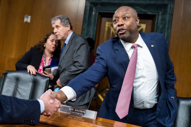 Ranking member Sen. Tim Scott (right) is seen during the Senate Banking, Housing and Urban Affairs Committee hearing in the Dirksen Federal Building on March 28.