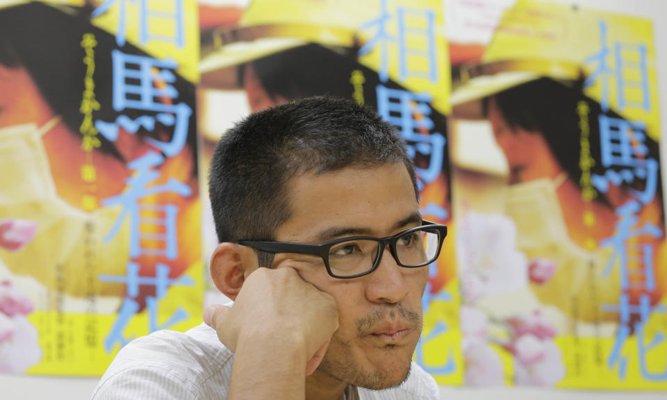 In this Friday, Sept. 7, 2012 photo, Japanese film director Yojyu Matsubayashi speaks during an interview in Tokyo. Matsubayashi took a more standard documentary approach for his “Fukushima: Memories of the Lost Landscape,” interviewing people who were displaced in the Fukushima town of Minami Soma. He followed them into temporary shelters in cluttered gymnasiums and accompanied their harried visits to abandoned homes with the gentle patience of a video-journalist. The March 2011 catastrophe in Japan has set off a flurry of independent films telling the stories of regular people who became overnight victims, stories the creators feel are being ignored by mainstream media and often silenced by the authorities. (AP Photo/Koji Sasahara)