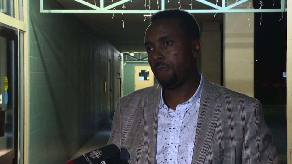 Jean Claude Munyezamu speaks to reporters outside a closed-door meeting in the Marlborough neighbourhood. He believes police should hold townhalls to update communities after other incidents if they want to build trust.