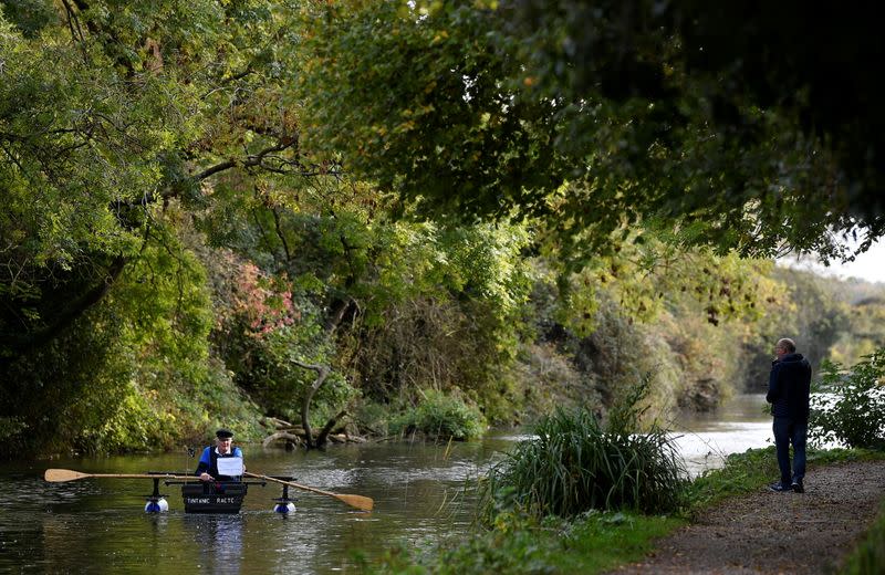 80-year old military veteran Stanley rows homemade boat named the "Tintanic" to raise funds for charity St Wilfrid's Hospice, in Chichester