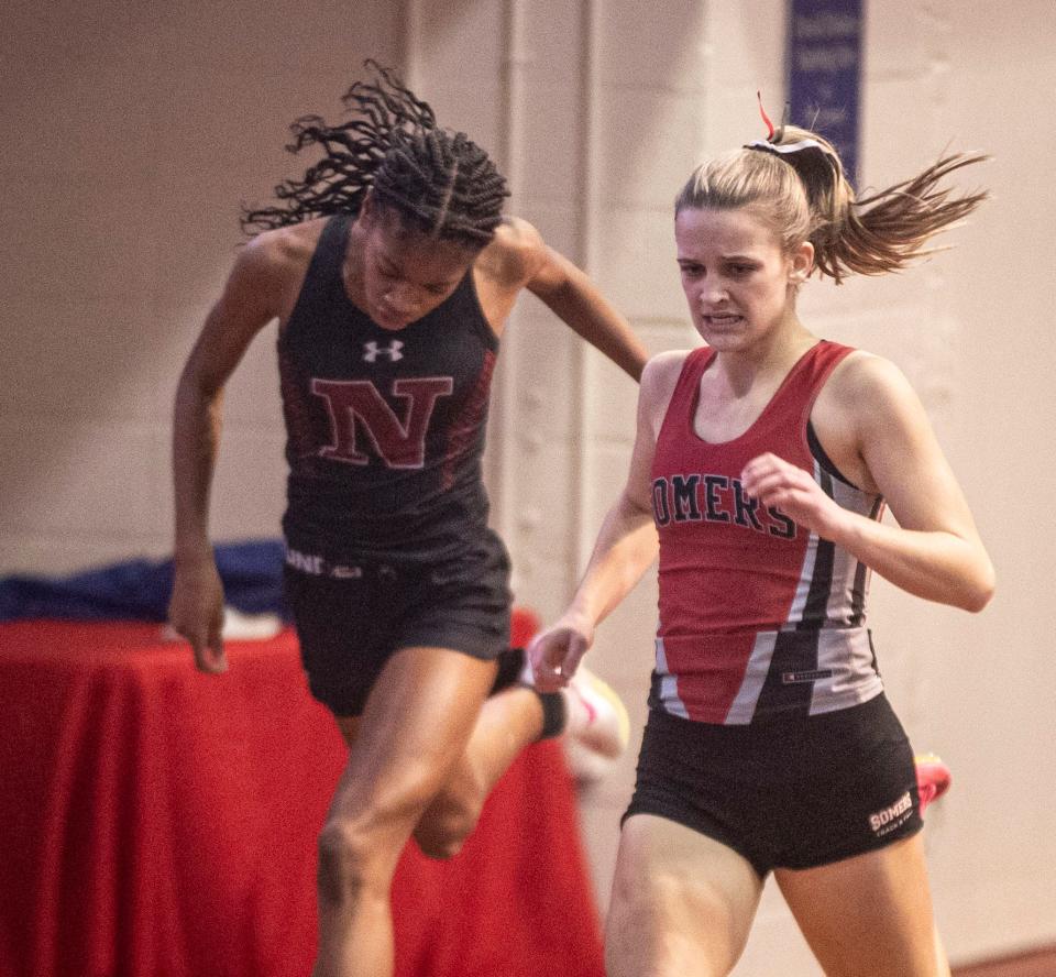 Haylie Donovan of Somers edged Jayda Johnson of Nyack to win the girls 300 meter dash at the Section 1 Class B track and field championships at The Armory in Manhattan Feb. 4, 2024.