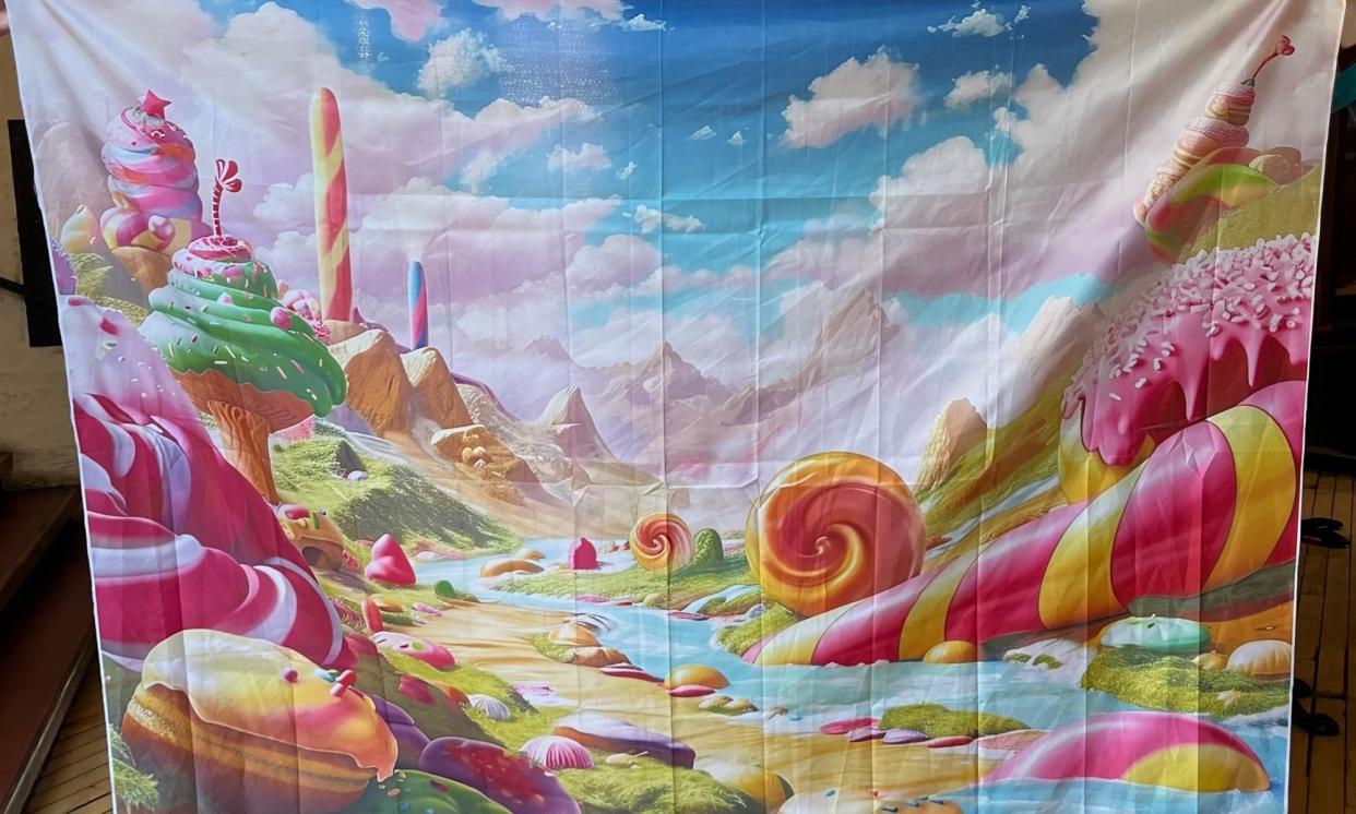 <span>The backdrop from the viral Willy Wonka event in Glasgow, which raised more than £2,000 for a Palestinian aid charity when auctioned off by Monorail Music, a local record store, on eBay. </span><span>Photograph: Monorail/PA</span>