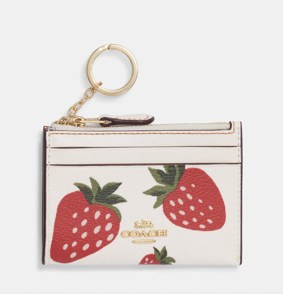 Mini Skinny Id Case With Wild Strawberry Print. (Photo via Coach Outlet)