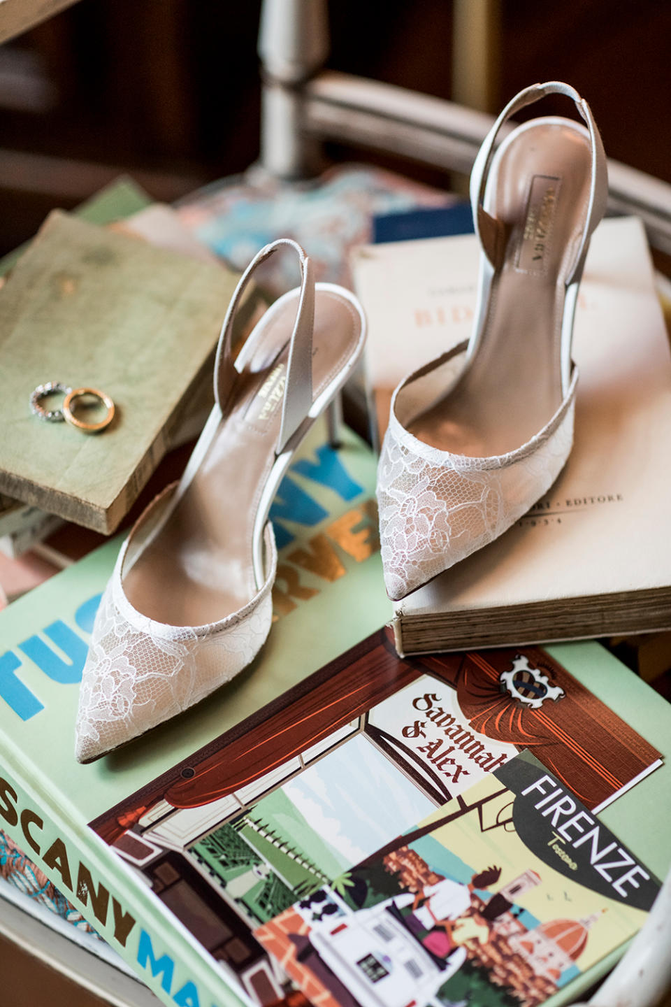 <p>The bride's delicate lace slingback heels were by Aquazzura.</p>