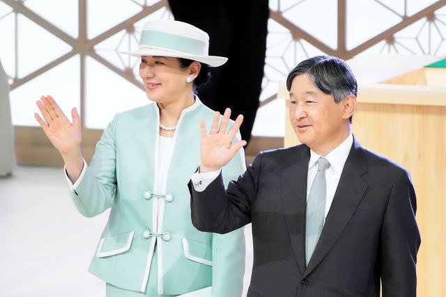 <p>Kyodo via AP Images</p> Empress Masako and Emperor Naruhito at a tree planting ceremony in Okayama, Japan, on May 26, 2024.
