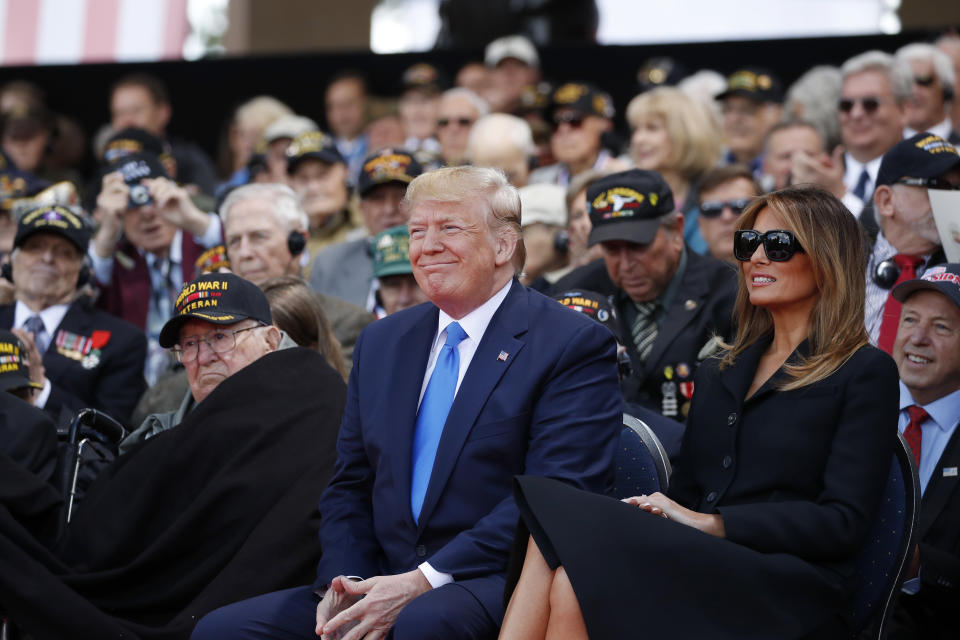 President Donald Trump and first lady Melania Trump, participate in a ceremony to commemorate the 75th anniversary of D-Day at the American Normandy cemetery, Thursday, June 6, 2019, in Colleville-sur-Mer, Normandy, France. (AP Photo/Alex Brandon)