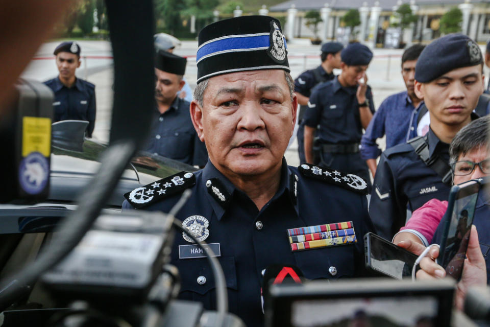 Inspector-General of Police Tan Sri Abdul Hamid Bador speaks to reporters at the Istana Negara February 24, 2020. — Picture by Firdaus Latif