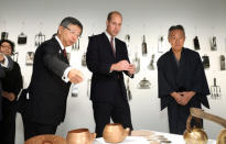 Britain's Prince William talks with Motoyuki Tamagawa, Head of Copperwear Workshop, at the official opening of Japan House in London, Britain, September 13, 2018. Tim P. Whitby/Pool via REUTERS