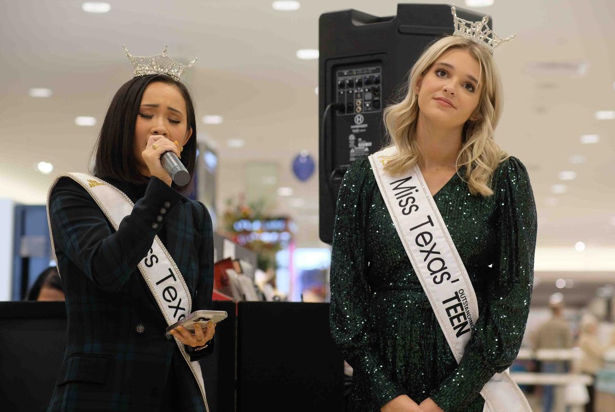 From left: Former Miss Texas Averie Bishop sings Christmas songs with the aid of Miss Texas' Outstanding Teen J-Belle Kimbrell on Wednesday night at its Grand Opening Fashion Gala at the Westgate Mall in Amarillo on Nov. 10, 2022.