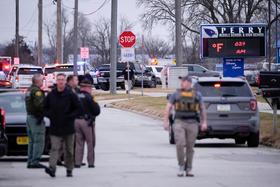 Police respond to Perry High School in Perry, Iowa., Thursday, Jan. 4, 2024. Police say there has been a shooting at the city's high school.(AP Photo/Andrew Harnik) ORG XMIT: IAAH301