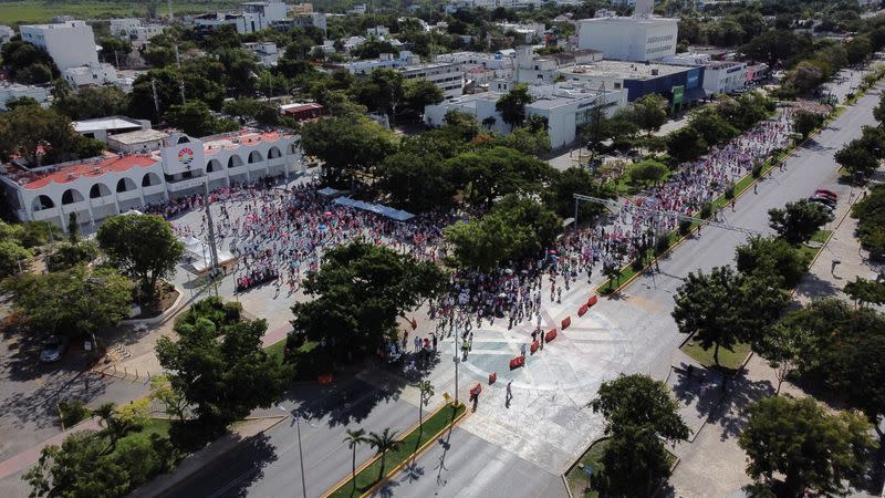 People take part in a protest against the electoral reform proposed by Mexican President Andres Manuel Lopez Obrador and in support of INE in Cancun Quintana Roo