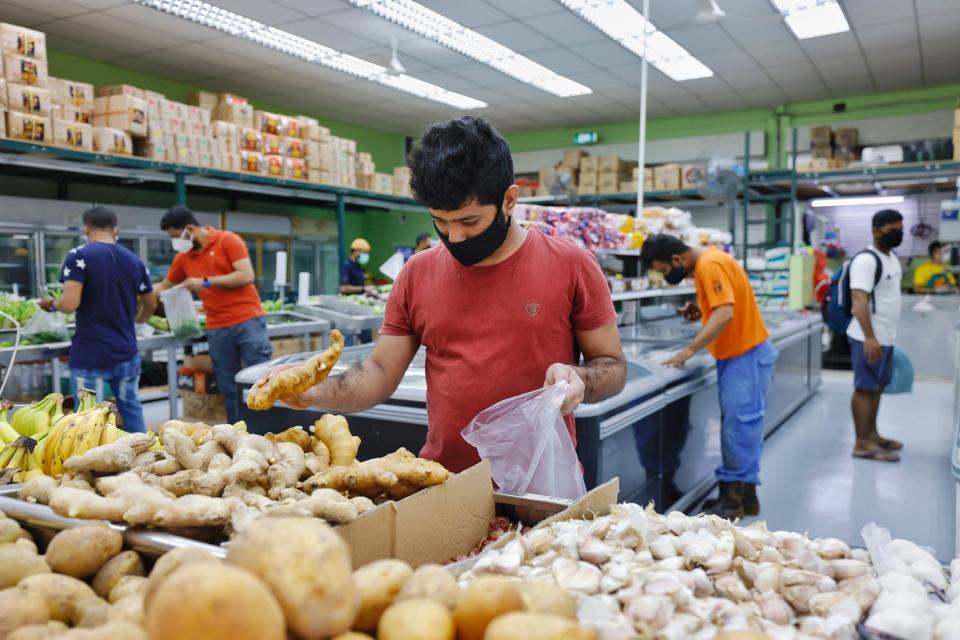 Migrant workers at Tuas South Recreation Centre. (PHOTO: Ministry of Manpower)