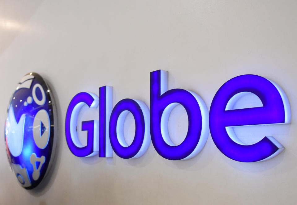 FILE PHOTO: A logo of Globe Telecom is seen at a Globe service center in Edsa, Quezon City, Metro Manila, Philippines. REUTERS/Dondi Tawatao