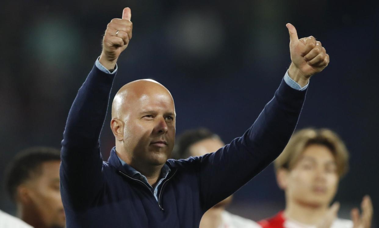 <span>Arne Slot salutes the crowd after Feyenoord’s 5-0 win against PEC Zwolle at De Kuip.</span><span>Photograph: Hollandse Hoogte/Shutterstock</span>