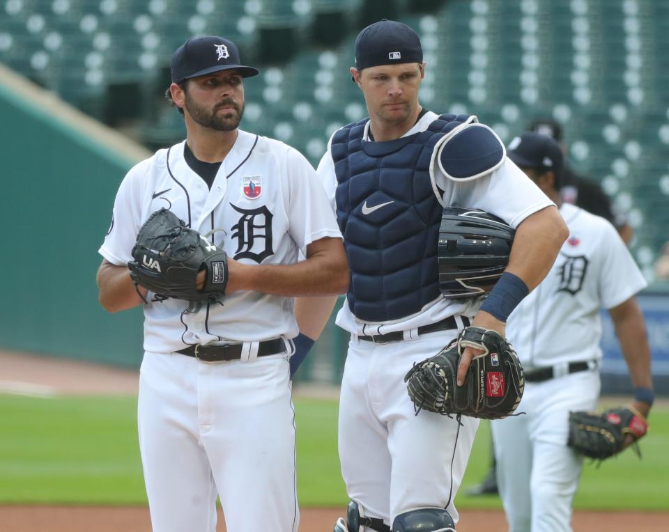 Detroit Tigers starting pitcher Michael Fulmer and catcher Grayson Greiner talk on the mound during third-inning action against the Cleveland Indians at Comerica Park, Sunday, Aug. 16, 2020.