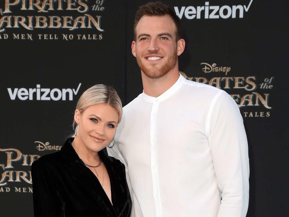 <p>Frederick M. Brown/Getty</p> Witney Carson and Carson McAllister at the premiere of Disney