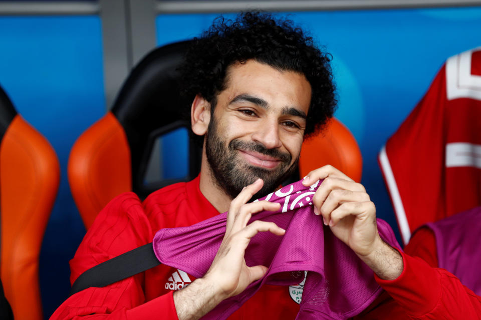 <p>The Liverpool striker appeared happy to be patient on the bench as his country started their World Cup campaign. (AP) </p>